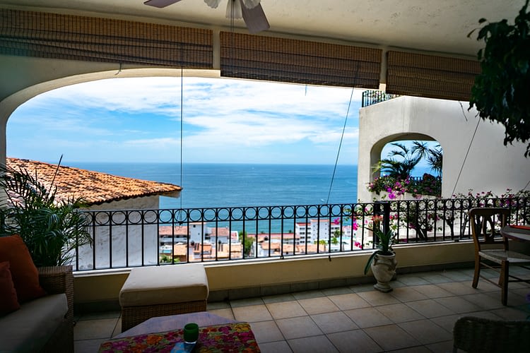 Ocean View Condo at Amapas with outdoor terrace and balcony facing the ocean.